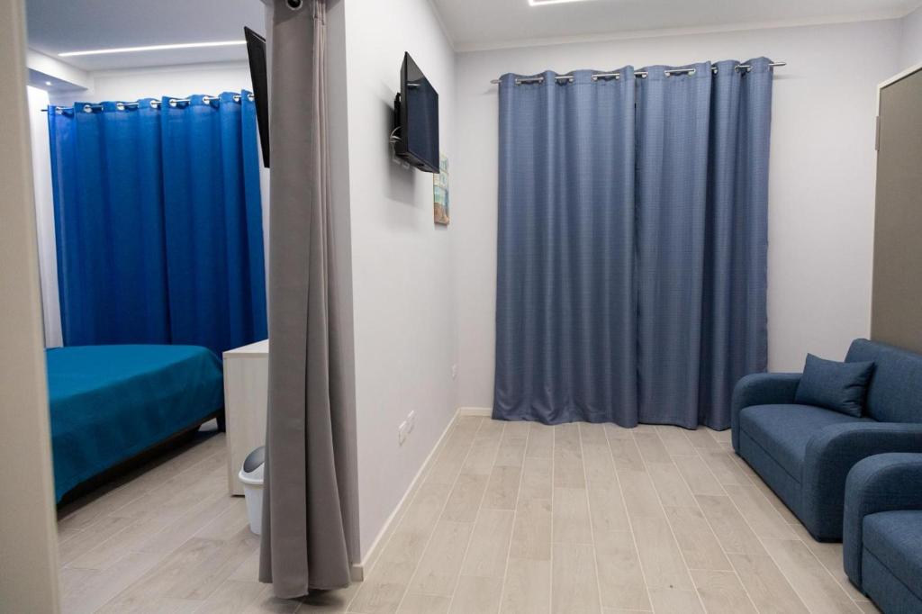 Posezení v ubytování Pietre Azzurre Rooms