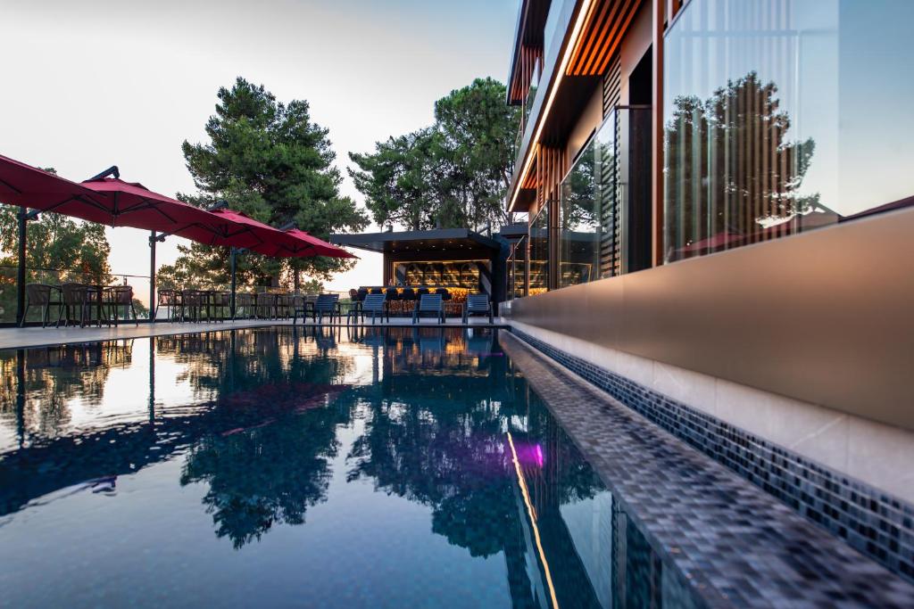 Bazén v ubytování Casa Mimas Hotel nebo v jeho okolí