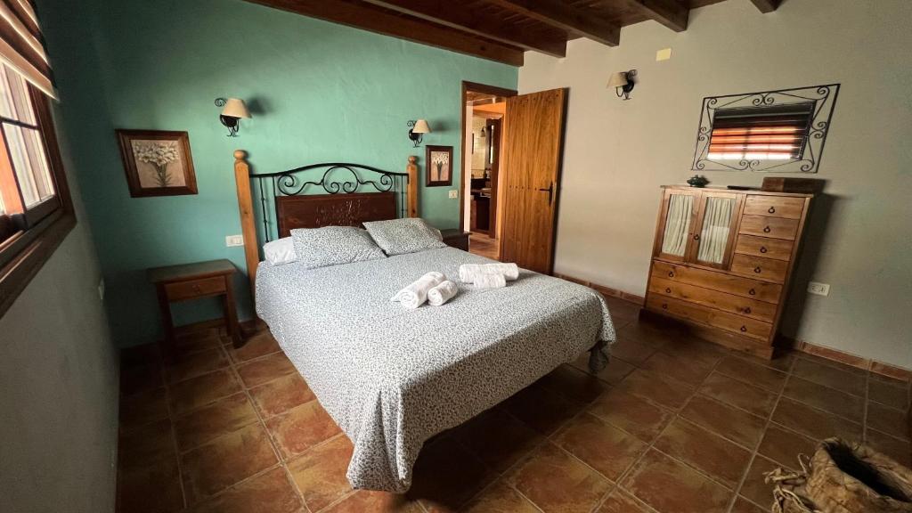 Postel nebo postele na pokoji v ubytování Casa Arteaga
