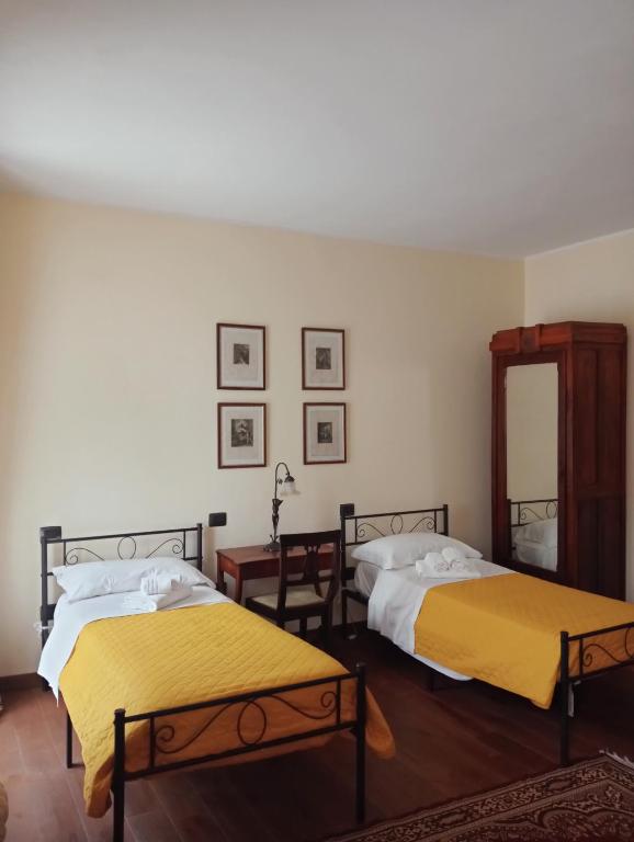 Postel nebo postele na pokoji v ubytování Residenza La Dimora ImPerfetta