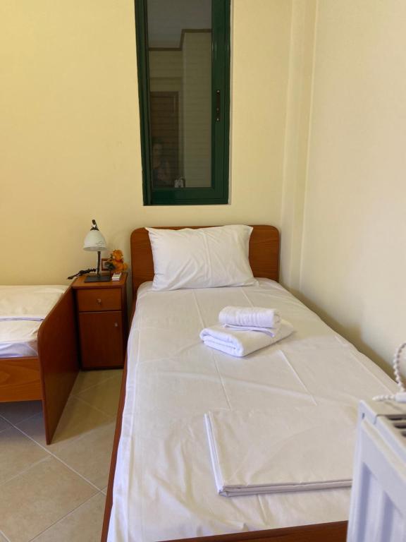 Ένα ή περισσότερα κρεβάτια σε δωμάτιο στο Alexander seaside Villa