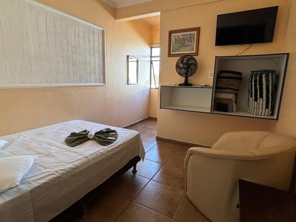 TV a/nebo společenská místnost v ubytování Hotel São Luis