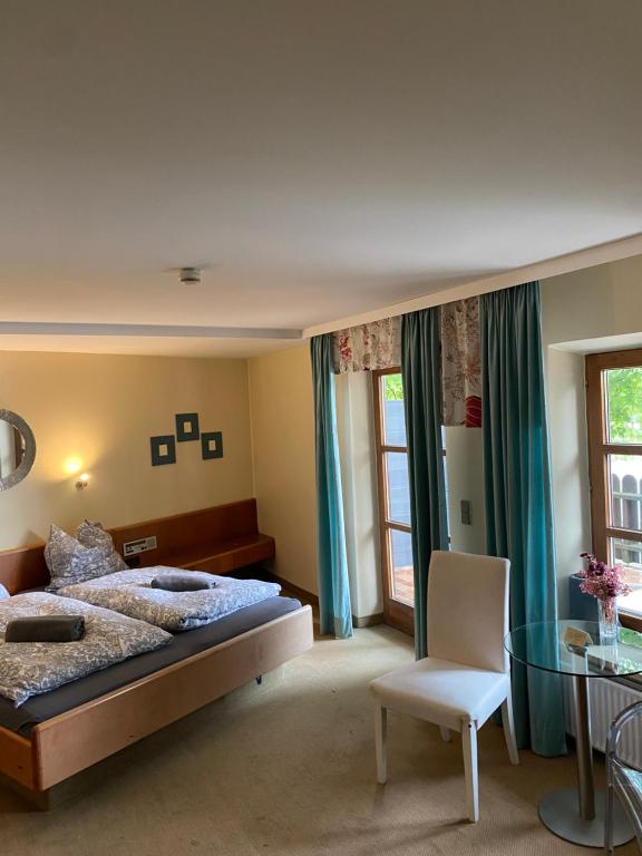 Postel nebo postele na pokoji v ubytování Gästehaus Altes Fährhaus