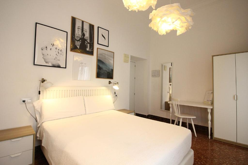 Posteľ alebo postele v izbe v ubytovaní Las Atarazanas - Design Hostal