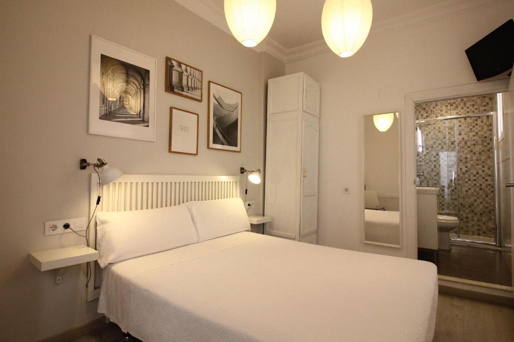 Posteľ alebo postele v izbe v ubytovaní Las Atarazanas - Design Hostal