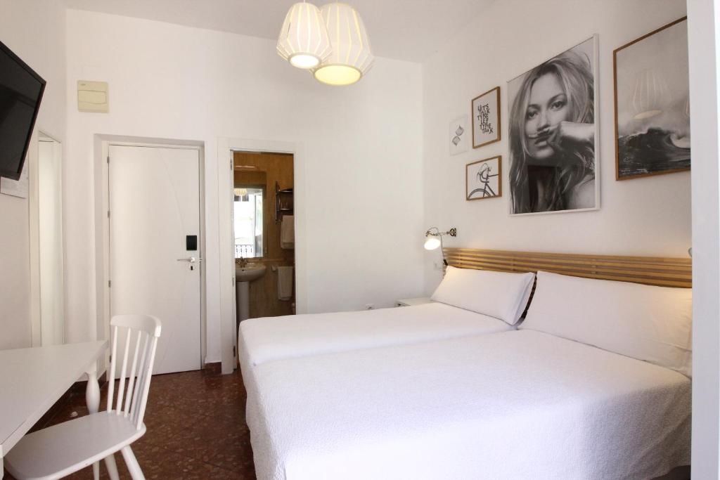 Posteľ alebo postele v izbe v ubytovaní Las Atarazanas - Design Hostal