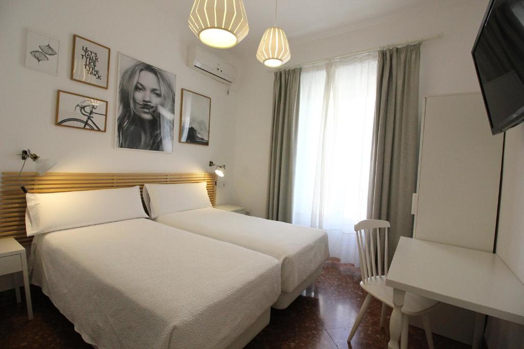 Posteľ alebo postele v izbe v ubytovaní Las Atarazanas - Design Hostal