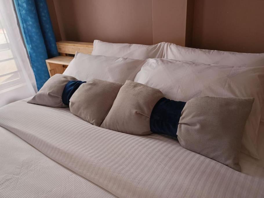 Postel nebo postele na pokoji v ubytování Talma Home