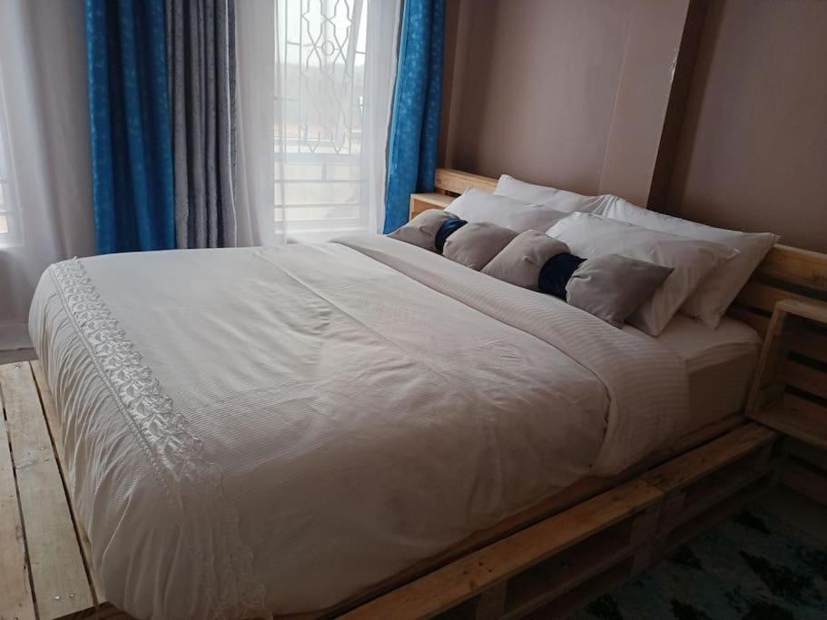 Postel nebo postele na pokoji v ubytování Talma Home