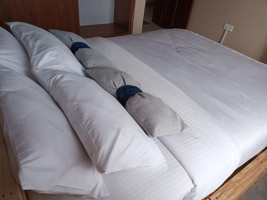 Postel nebo postele na pokoji v ubytování Talma Home