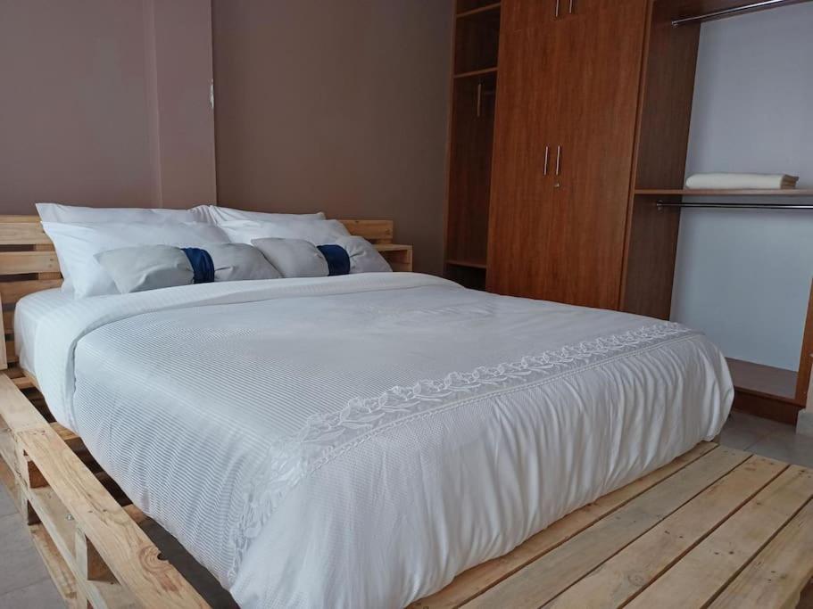 Postel nebo postele na pokoji v ubytování Talma Home