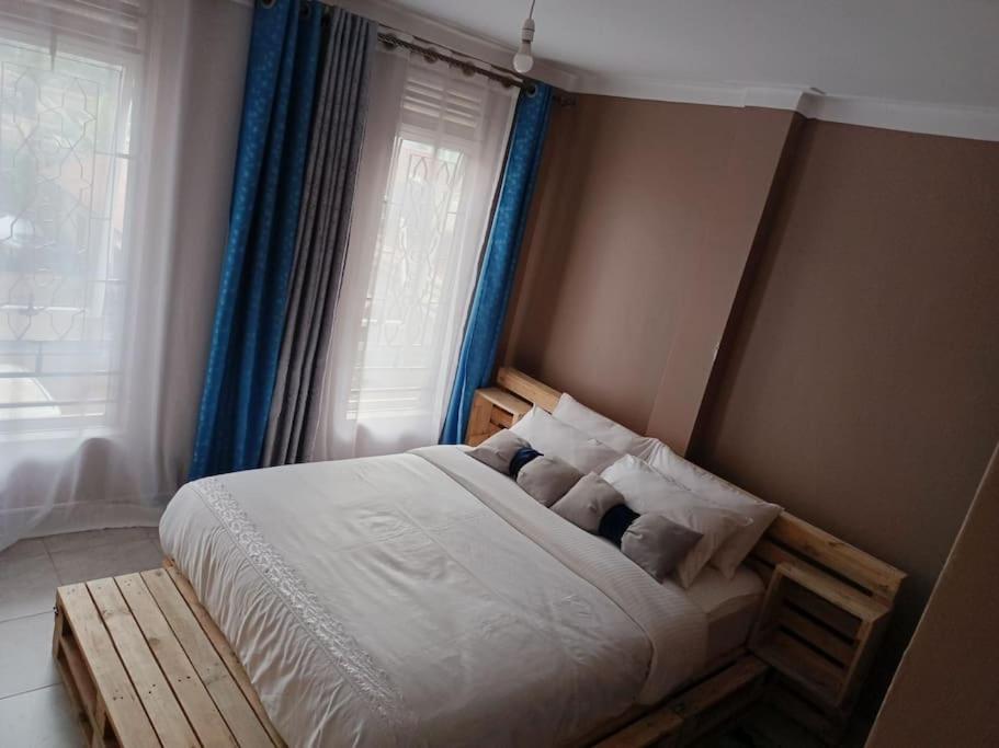 Postel nebo postele na pokoji v ubytování Talma Home