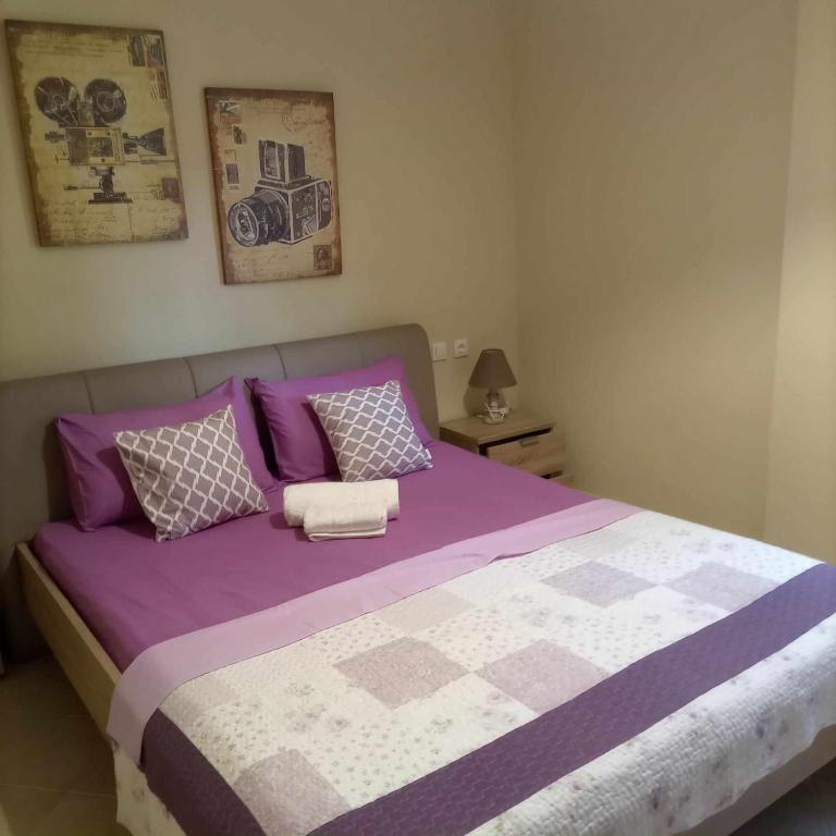Postel nebo postele na pokoji v ubytování Fanis Apartments