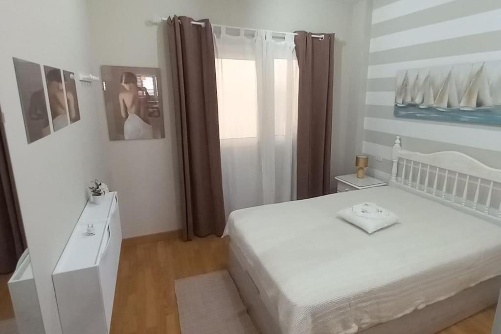 Postel nebo postele na pokoji v ubytování Casa Aurora