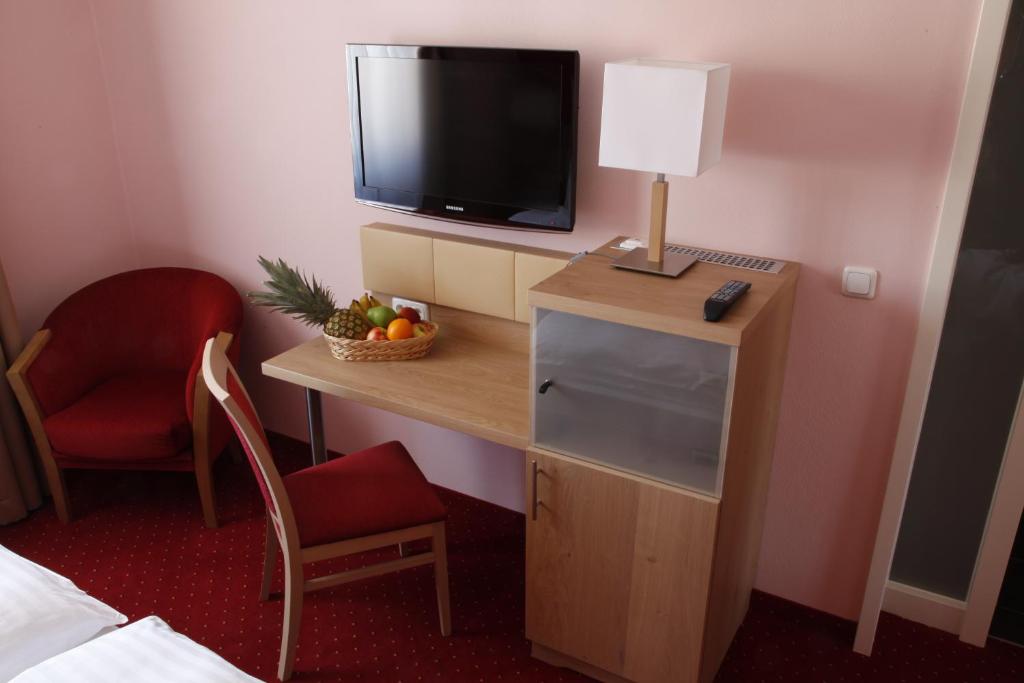 TV a/nebo společenská místnost v ubytování Hotel-Gasthof-Kohlmeier
