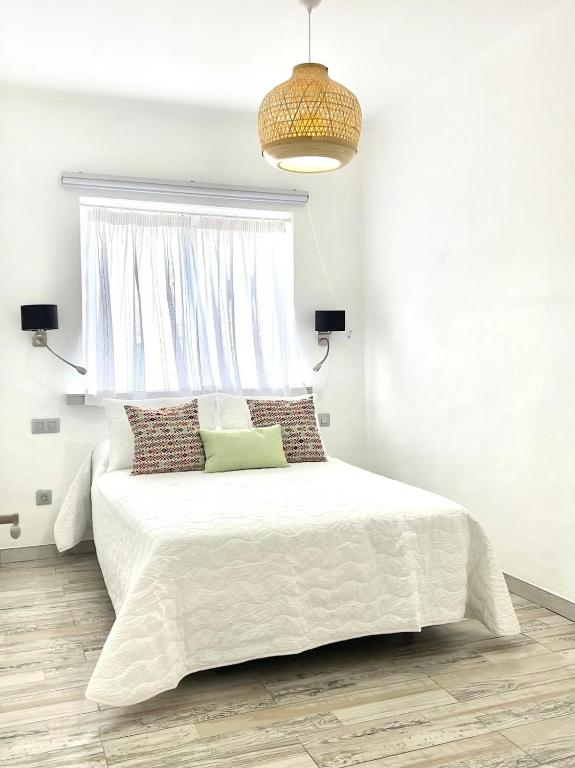 Postel nebo postele na pokoji v ubytování Casa Gary
