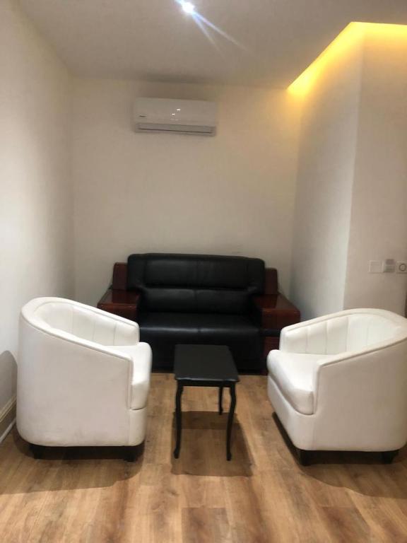 Posezení v ubytování Crownsville Hotel - Airport Road
