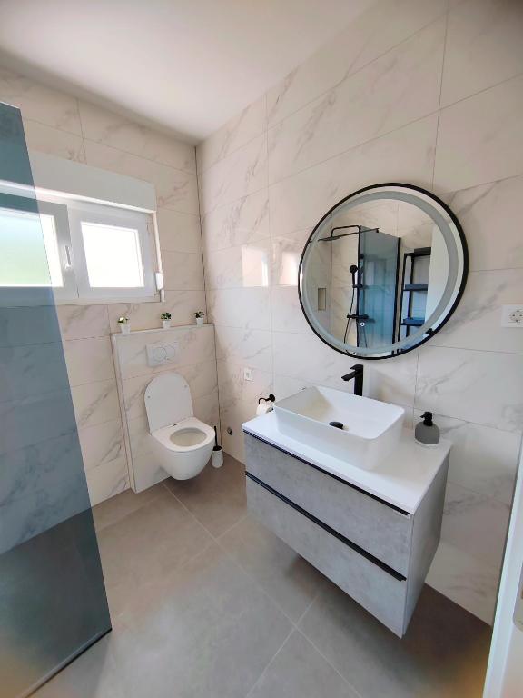Koupelna v ubytování Apartments Alen