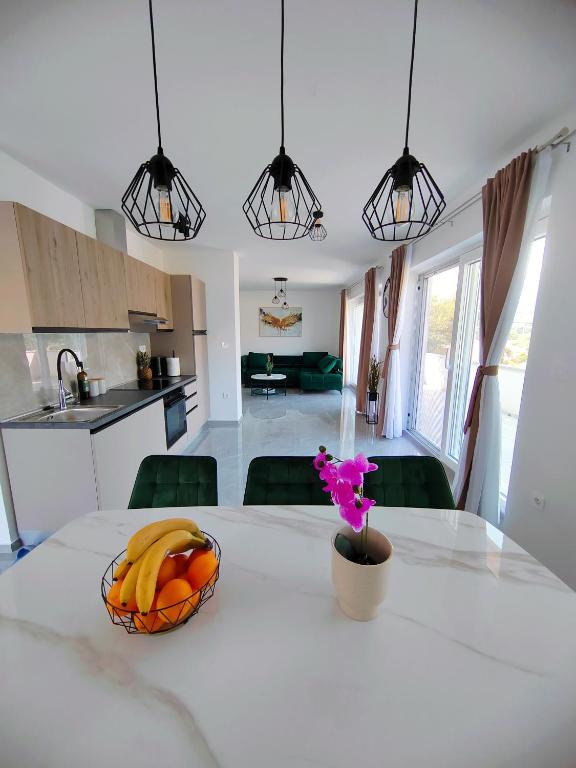 Kuchyň nebo kuchyňský kout v ubytování Apartments Alen