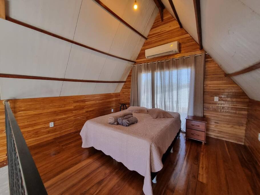 Postel nebo postele na pokoji v ubytování Chalé SZ Pantanal