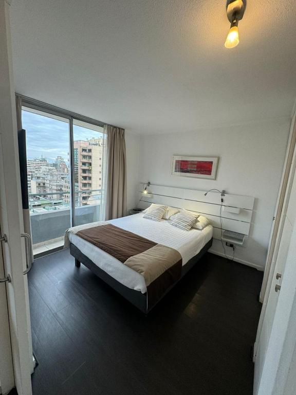 Voodi või voodid majutusasutuse Apart Lyon Suite toas