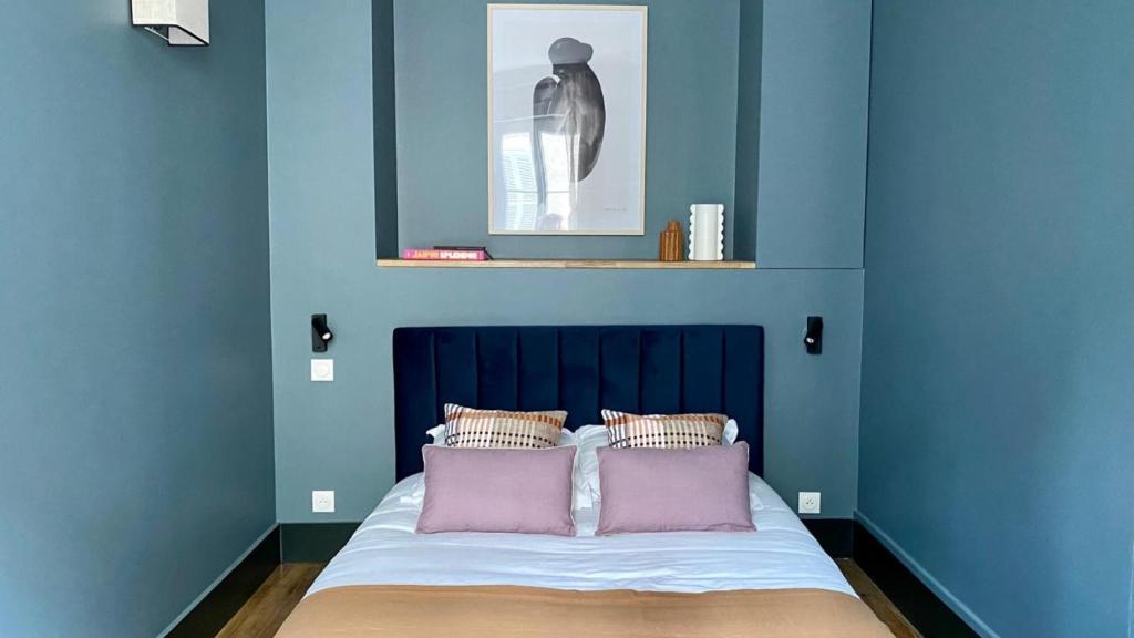 Postel nebo postele na pokoji v ubytování L'escapade rêvée