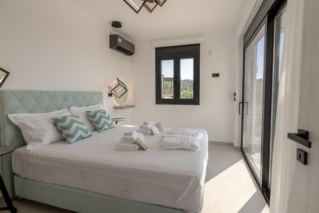 Postel nebo postele na pokoji v ubytování Ventum Villas