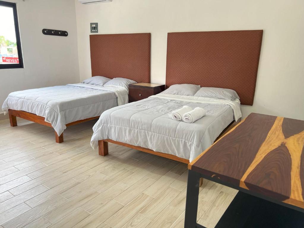 Postel nebo postele na pokoji v ubytování 3B Departamentos