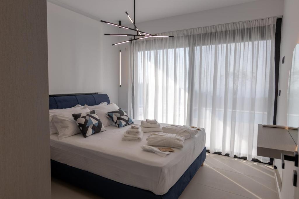 Postel nebo postele na pokoji v ubytování Ventum Villas