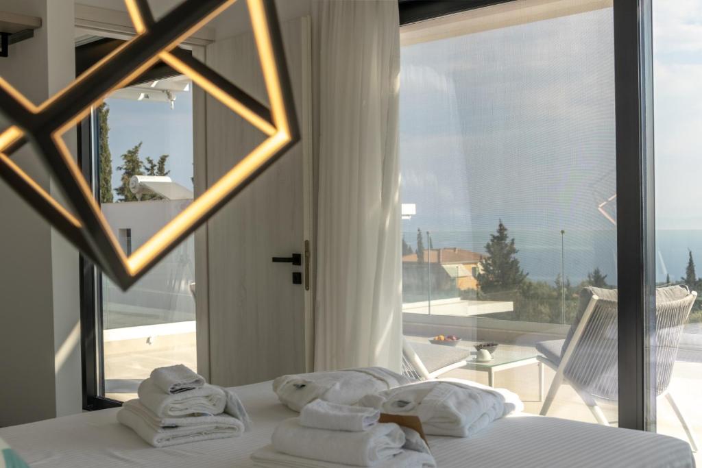 Postel nebo postele na pokoji v ubytování Ventum Villas