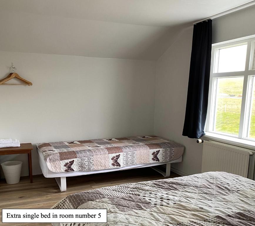 Postel nebo postele na pokoji v ubytování Guesthouse Básar