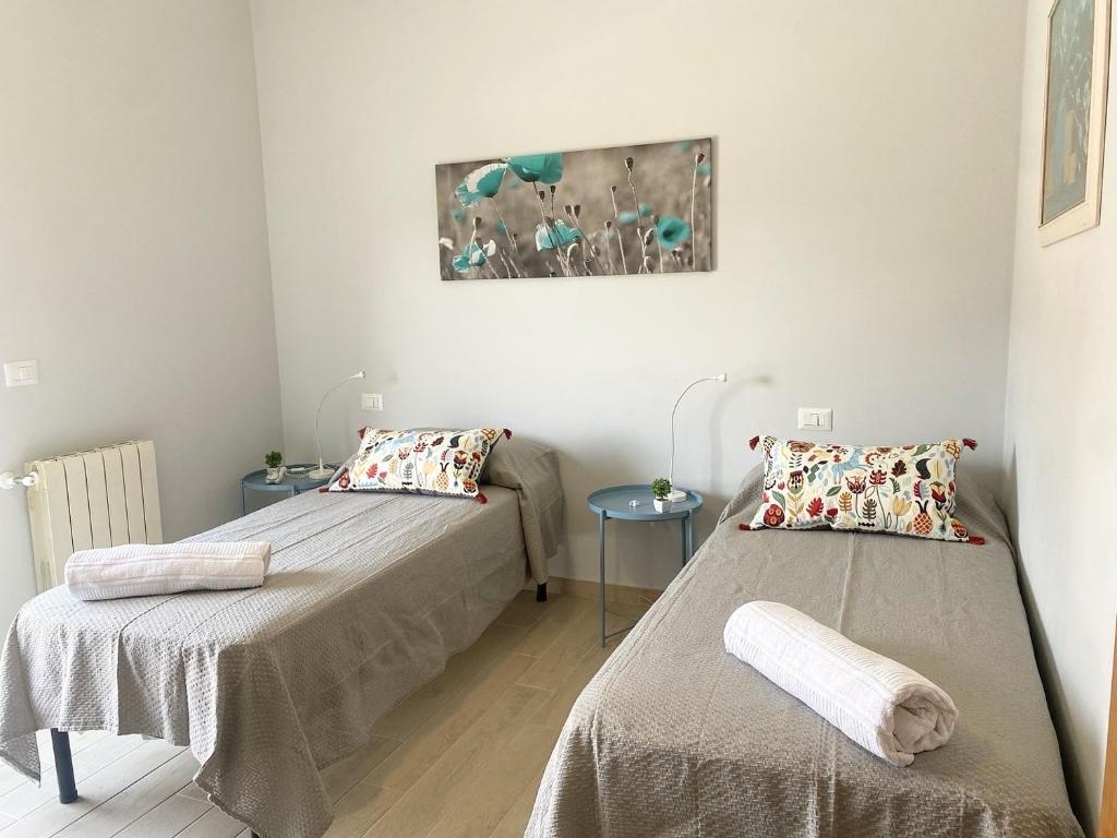 Posteľ alebo postele v izbe v ubytovaní B&B MaLò Family Friendly