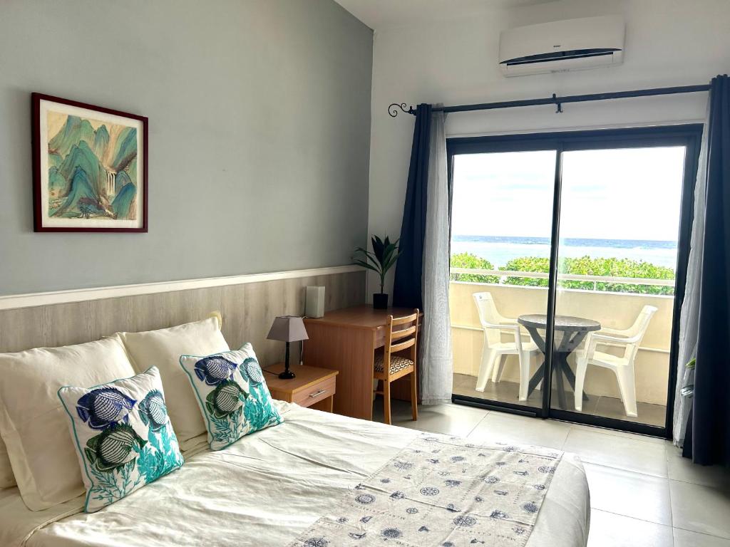 Кровать или кровати в номере Blue Beryl Guest House