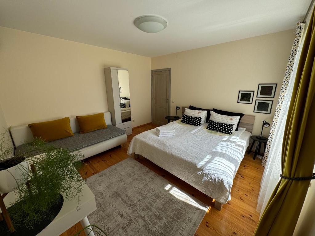 Lova arba lovos apgyvendinimo įstaigoje Guest house ''8 Smilgos''