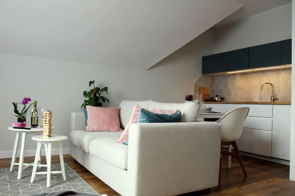 Posezení v ubytování Przytulny apartament z ogrodem