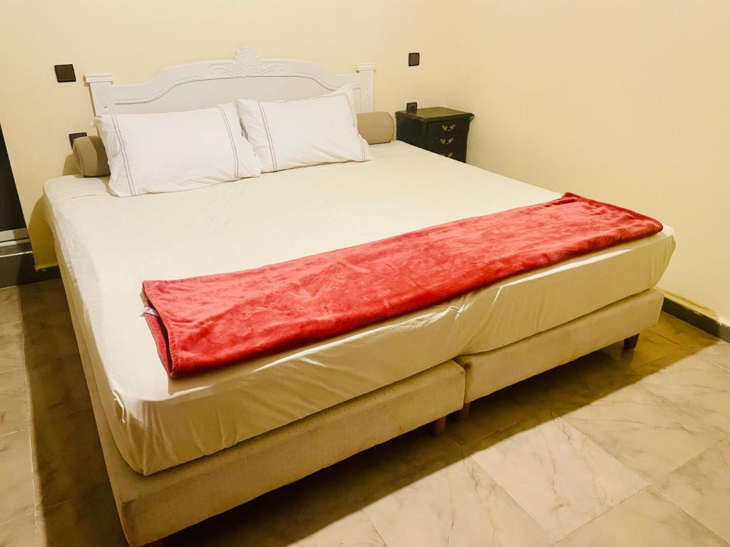 Postel nebo postele na pokoji v ubytování Villa Baddi Marrakech
