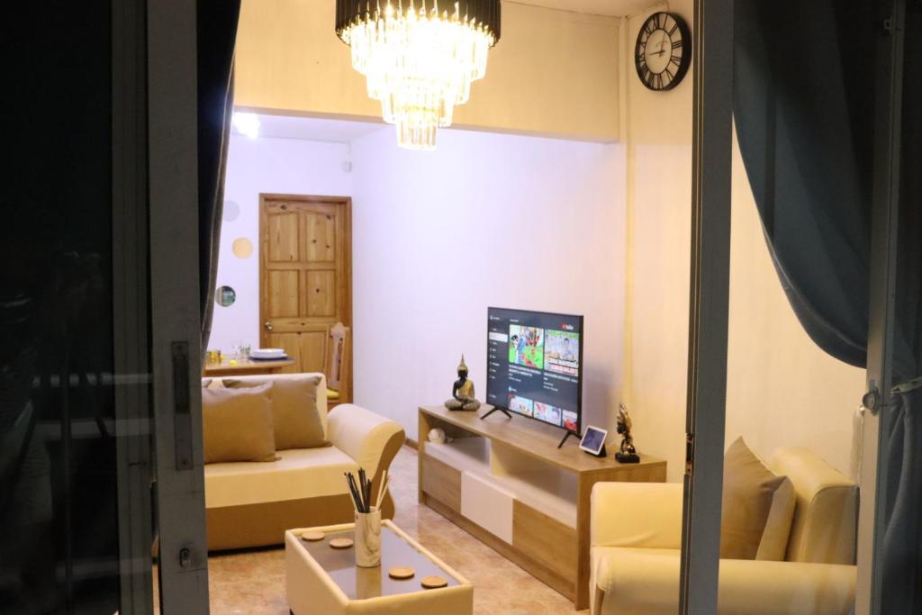 Televizors / izklaižu centrs naktsmītnē Sunset view Suite
