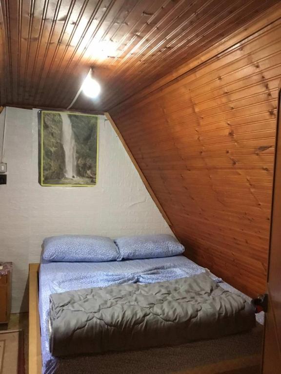 Postel nebo postele na pokoji v ubytování Zariklis