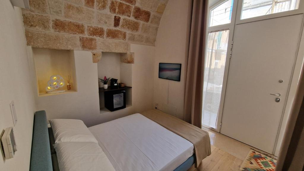 Postel nebo postele na pokoji v ubytování ION Luxury Home