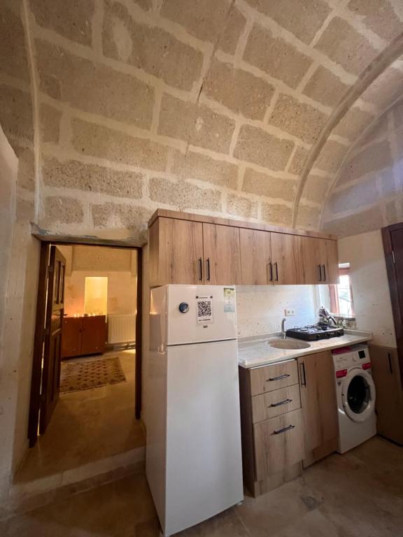 Kuchyň nebo kuchyňský kout v ubytování Uluyol Stone House