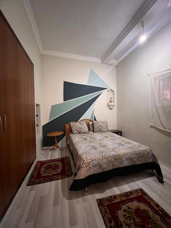 Postel nebo postele na pokoji v ubytování Uluyol Stone House