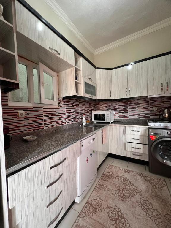 Kuchyň nebo kuchyňský kout v ubytování Uluyol Stone House