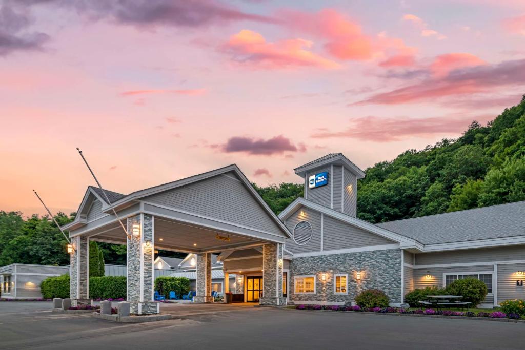 a building with a clock on the front of it at Best Western Springfield Hotel in Springfield