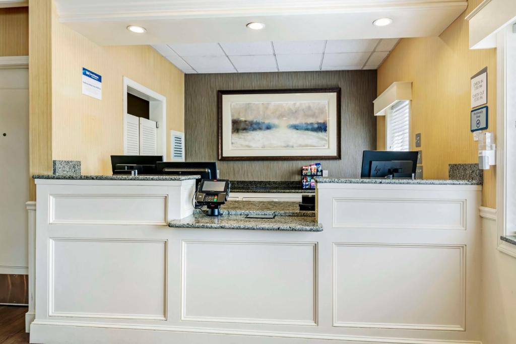 a waiting room at a hospital with white doors at Best Western Springfield Hotel in Springfield