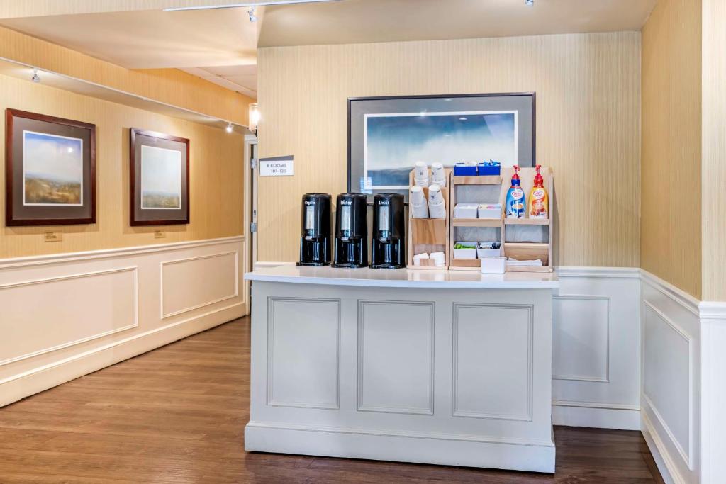 a counter in a room with a coffee shop at Best Western Springfield Hotel in Springfield