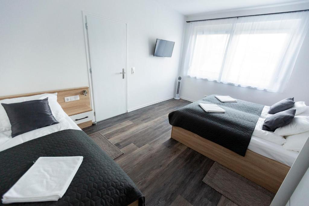 Postel nebo postele na pokoji v ubytování Horváth Apartman