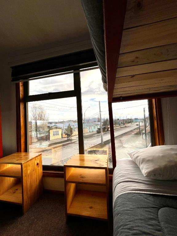 Postel nebo postele na pokoji v ubytování Hostel Rosa de los Vientos
