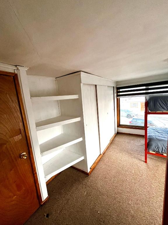 Postel nebo postele na pokoji v ubytování Hostel Rosa de los Vientos