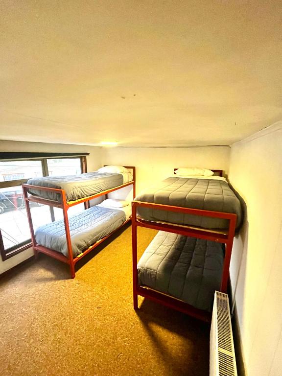 Postel nebo postele na pokoji v ubytování Hostel Rosa de los Vientos