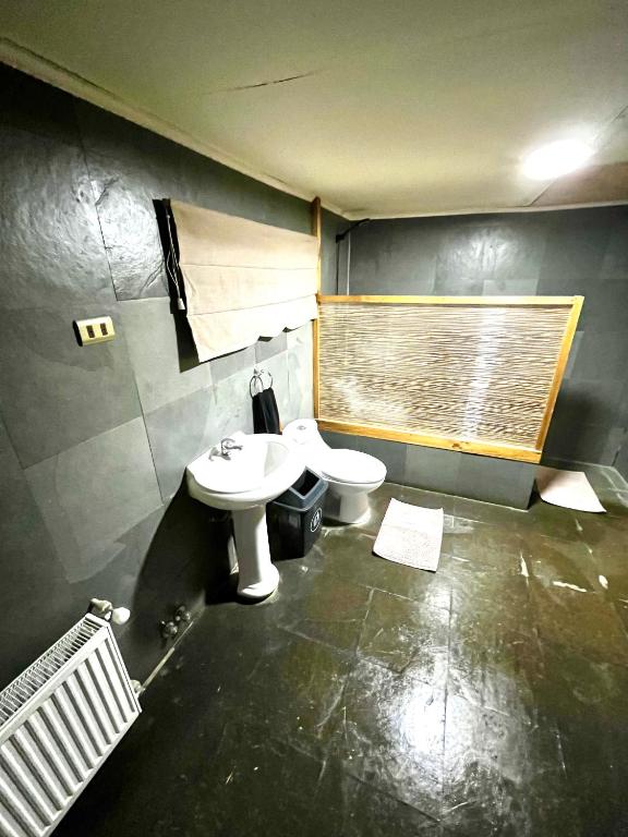 Koupelna v ubytování Hostel Rosa de los Vientos